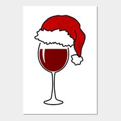 a wine glass with a santa hat on it