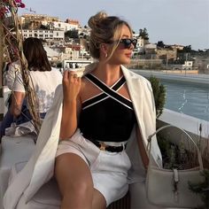 Chic cross v-neck crop top Expensive Looking Outfits Classy Summer, Trendy V-neck Crop Top, Minimal Crop Top, Glamorous V-neck Crop Top For Summer, Chic White V-neck Top, Chic White V-neck Crop Top, Chic Black V-neck Crop Top, Wag Outfits, Europe Fits