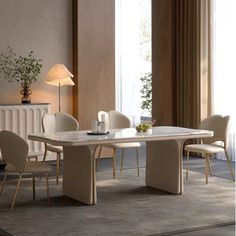 a dining room table with chairs and a radiator on the wall behind it