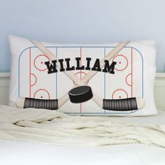 a pillow with an image of a hockey goalie's jersey on it and the name william