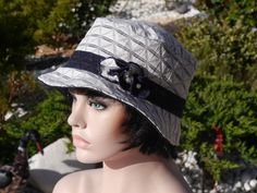 Navy blue and white bob hat, elegant and casual, will seduce you with its simple and classy shape. This hat can be worn in different ways and adapts to several outfits. This hat is fully lined with a drawstring to fit several sizes. This hat is extendable from size 59 to 62. This hat is a unique piece. This hat is 100% diverse compositions. Elegant Brimmed Lined Sun Hat, Elegant Lined Brimmed Sun Hat, Elegant White Bucket Hat, Elegant Adjustable Brimmed Bucket Hat, Elegant Summer Cloche Bucket Hat, Elegant Fitted Bucket Hat With Short Brim, Elegant Short Brim Bucket Hat For Spring, Elegant Cloche Bucket Hat For Spring, Elegant Bucket Hat