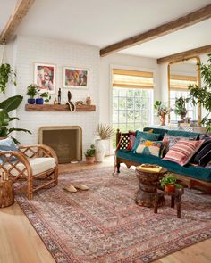 a living room filled with furniture and plants