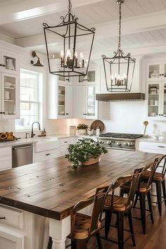 a large wooden table sitting in the middle of a kitchen