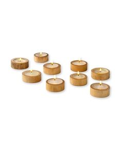 wooden candles are arranged in the shape of an eight - piece set on a white background