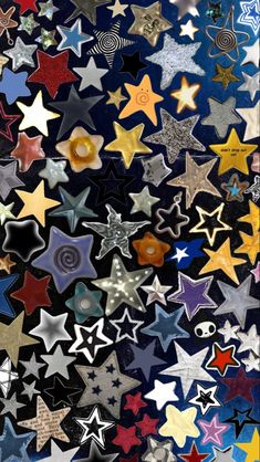 many different colored stars are arranged together