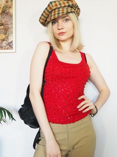 90's Vintage sequin beaded knit top in red Top is in great vintage condition. SIZE. Model usually wears UK 6, top could fit UK 6-8. Fabric is stretch. Please, check the measurements before buying. MEASUREMENTS. Bust - 70 cm, length - 54 cm. Item is made from mixed material. Color may differ slightly depending on the color calibration of the device you're viewing on. If You have more questions about products or shipping, please drop me a message. Wish You great shopping, Mellina Glamorous Embellished Top For Winter, Y2k Fitted Evening Top, Y2k Fitted Party Tops, Fitted Y2k Evening Tops, Red Y2k Style Tops For Party, Red Sequin Tops For Spring, Red Sleeveless Tops For Party Season, Fitted Winter Tops With 90s Style, Red Sequined Tops For Fall