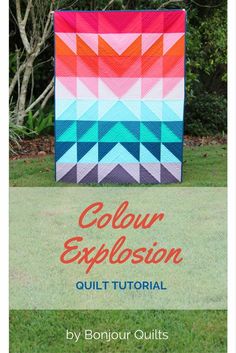 a colorful quilt on the grass with text overlay that reads,'color explosion quilt pattern