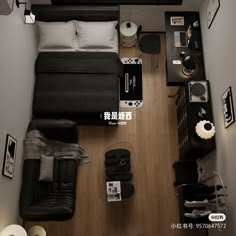 an overhead view of a bedroom with black furniture