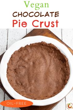 chocolate pie crust in a white bowl on a wooden cutting board with the title vegan chocolate pie crust