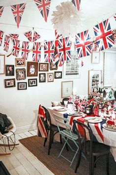 the dining room is decorated with british flags