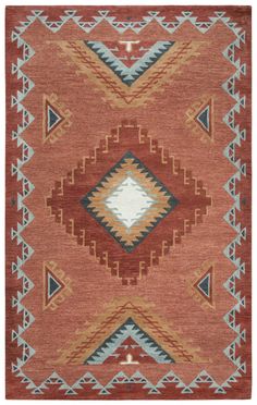 an orange, blue and red rug with geometric designs on the bottom half of it