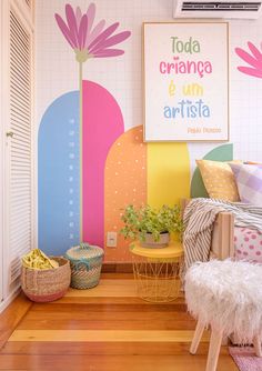 a room with colorful walls and wooden floors