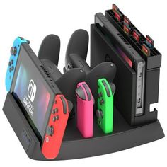 a nintendo wii game controller holder with controllers