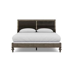 an image of a bed with white sheets and pillows on the headboard or foot board