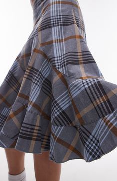 A classic plaid pattern accentuates the artsy, purposely disjointed look of this skirt cut with swooping asymmetric seams. 26" length (size Ts-8) Hidden side-zip closure 97% Cotton,3% Elastane Machine wash, line dry Imported Plaid A-line Skirt With Lining, Plaid Cotton Skirt For Work, Plaid Tiered Ruffled Skirt, Fitted Cotton Plaid Skirt, Plaid Flared Relaxed Fit Skirt, Plaid Cotton Flared Skirt, Plaid Flared Skirt With Relaxed Fit, Cotton Plaid Flared Skirt, Plaid Flared Skirt