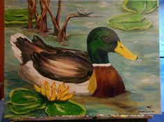 a painting of a duck in the water with lily pads on it's side