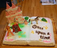 a birthday cake with an open book and princess characters on it that says, once upon a time