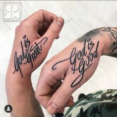 two hands with tattoos that say god is good