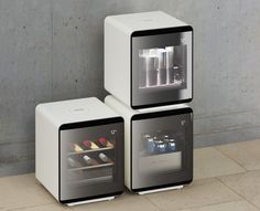 three refrigerators with different types of wine in them