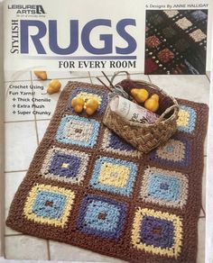 a book with an image of a rug on the cover and some fruit in a basket