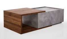 a concrete and wood coffee table sitting on top of a white floor