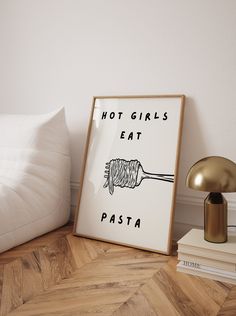 Introducing the "Hot Girls Eat Pasta Print"--an aesthetic and retro-inspired kitchen decor piece featuring an illustration of a fork with pasta wrapped around it, accompanied by the text "Hot Girls Eat Pasta." This high-quality art print is perfect for adding a touch of charm and personality to your kitchen wall decor. Ideal for food enthusiasts, retro decor lovers, and those who enjoy fun and stylish kitchen art, this print serves as a delightful reminder of the joys of pasta and adds a playful visual element to any kitchen. Whether you display it in your own kitchen or gift it to a friend, this print is sure to bring warmth and smiles to any space. Crafted with meticulous attention to detail, the vibrant colors and high-resolution quality ensure that the whimsical design is beautifully r Cute Kitchen Decor Themes, Vegan Kitchen Decor, Funny Kitchen Decor, Kitchen Pictures Decor Wall Art, Trendy Kitchen Decor, Retro Dinner, Aesthetic Kitchen Decor, Fun Kitchen Decor, Kitchen Decor Retro