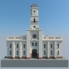 a large white building with a clock tower