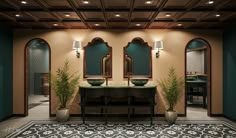 a bathroom with two sinks, mirrors and plants on the counter top in front of them