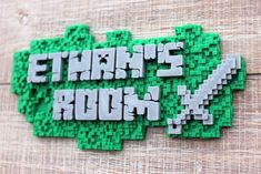 a close up of a sign made out of lego blocks with the words thomas's run on it