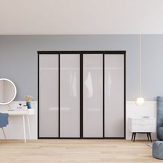 an empty room with a chair, desk and closet doors on the wall in front of it