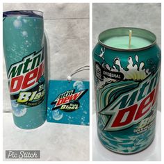 a can of mountain dew next to a lit candle with a tag on the side