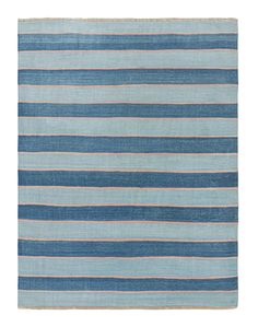 a blue and white striped rug on a white background with an orange stripe in the middle