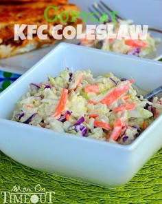 a white bowl filled with coleslaw on top of a green table