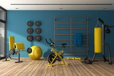 an exercise room with blue walls and yellow gym equipment - 3d renderings available for commercial use