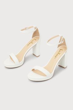 There's nothing you'll love more than how you look in the Lulus Kinsella White Platform Ankle Strap High Heels! These essential heels have a smooth faux leather composition that shapes an almond-shaped toe bed (atop a 0.50"" toe platform) and a slender toe strap. A sturdy heel cup supports a matching adjustable ankle strap that secures with a shiny gold buckle, all atop an eye-catching block heel. 3. 75" wrapped block heel. Cushioned insole. Upper Material: Synthetic. Sole Material: TPR. Man mad Damas Shoes For Quince, Cute Light Pink Heels, Hills For Prom, White Wedges Heels, Homecoming High Heels, White Heels Sparkly, Hoco Heels White, Cute Hoco Shoes, High Heels For Homecoming