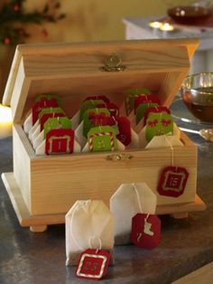 an open wooden box filled with christmas decorations