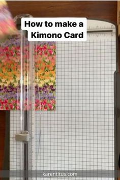 someone is making a kimono card with scissors