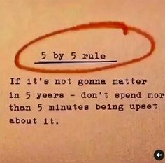 a piece of paper with an orange marker on it that says, 5 by 5 rules if it's not going matter in five years - don't spend spend