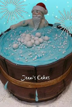 there is a cake that looks like santa in the bathtub with bubbles on it