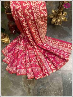 Drape yourself in elegance with this beautiful Bishnupuri Katan Silk Saree. Crafted with lightweight silk and featuring a beautiful pink shade, it has a versatile style perfect for evening parties and casual wear. Its hand block printed, floral hand block prints and elegant design make it the perfect choice for any occasion. Certified by Silk Mark, this saree is sure to make a lasting impression.  Slay that party with this statement saree. 👉Styling tip: Accessorize with german silver jewelry for a super trendy look. 👉Fall and Pico - done 👉Blouse - unstitched 👉Hand block printed saree. Silk mark certified saree. Please note: 👉Color may vary slightly from the picture. 👉Thread pulls, knots and few thread gaps are common in this type of saree and is not a defect. 👉Mild paint stains are Bollywood Style Batik Print Saree For Diwali, Red Chanderi Blouse Piece With Block Print, Traditional Art Silk Saree With Batik Print, Red Blouse Piece With Block Print For Puja, Red Block Print Blouse Piece For Diwali, Diwali Batik Print Saree In Traditional Drape, Red Block Print Blouse Piece For Puja, Pink Anarkali Traditional Wear With Block Print, Traditional Drape Saree With Batik Print For Diwali