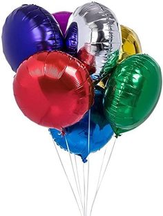 a bunch of balloons that are in the air