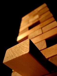 wooden blocks stacked on top of each other in the dark royalty images and stock photos