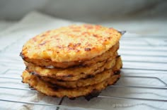 a stack of food sitting on top of a metal rack