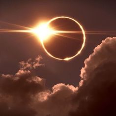 the solar eclipse is seen through clouds in this image