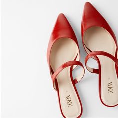 Genuine Zara New With Tag Material: Vegan Leather Color: Color Super Chic Red Mules With Asymmetric Strap. Pointed Toes. Euro Size 37(6.5), 38(7.5), 39(8), 40(9) Chic Mules With Red Sole, Chic Red Party Mules, Chic Red Mules For Party, Chic Red Closed Toe Mules, Casual Red Heels For Spring, Elegant Red Summer Mules, Elegant Spring Mules With Red Sole, Elegant Red Mules For Spring, Spring Red Pointed Toe Heels