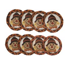 a set of six brown and white coasters with a scarecrow on it's face