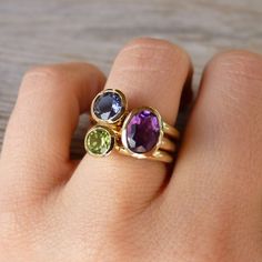 14k Gold Stacking Ring Set Recycled Gold and by onegarnetgirl Oval Amethyst Birthstone Ring In Yellow Gold, Oval Multi-stone Peridot Gemstones, Oval Peridot Gemstones For Anniversary, Oval Multi-stone Amethyst Gemstones, Gold Oval Multi-stone Stackable Rings, Multi-stone Stackable Rings, Oval Multi-stone Yellow Gold Birthstone Ring, Green Oval Amethyst Ring For Anniversary, Green Amethyst Oval Ring For Anniversary