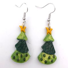 green and yellow ceramic christmas tree earrings on silver earwires against a white background