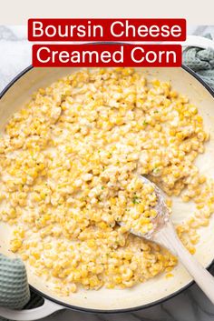 a skillet filled with cheese and corn