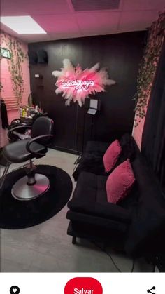 the salon is decorated in pink and black